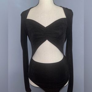 never been worn still has tags bodysuit